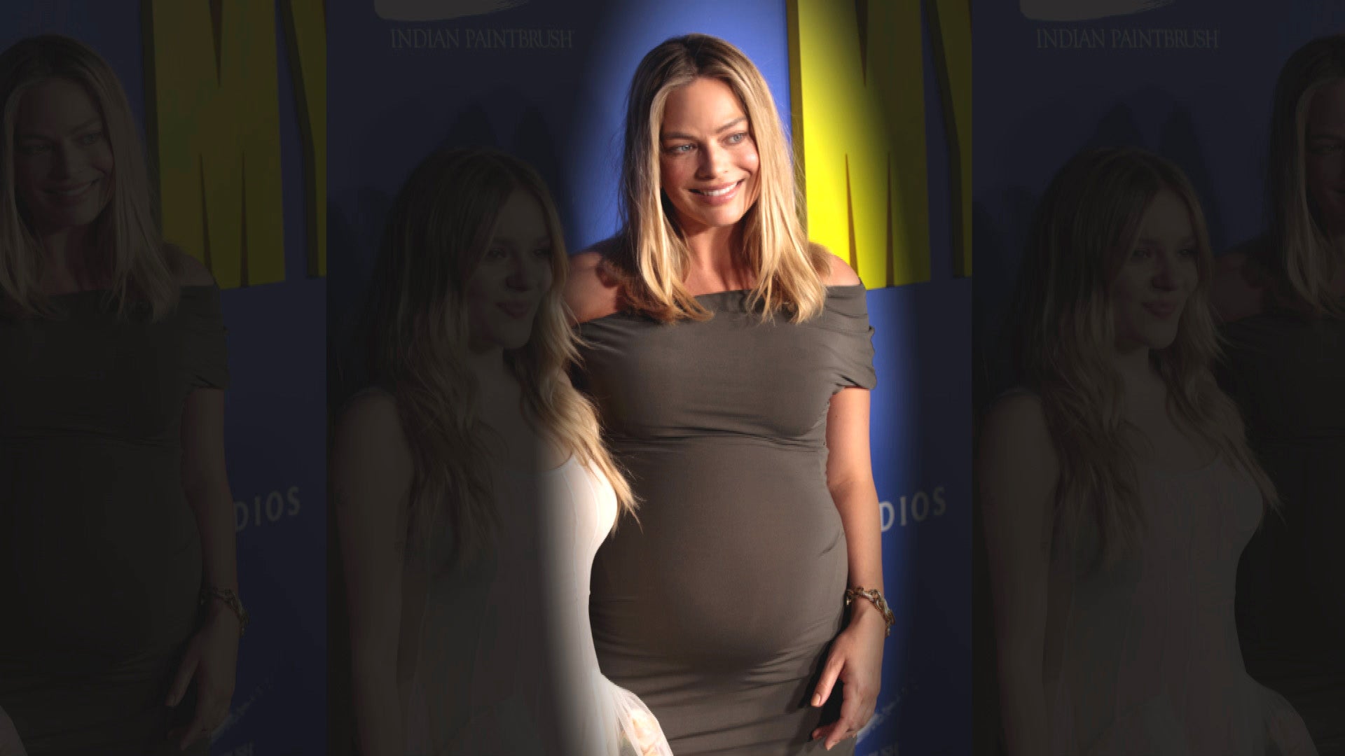 Pregnant Margot Robbie Makes First Public Appearance Baring Baby Bump